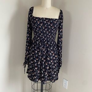 Black floral mini dress.